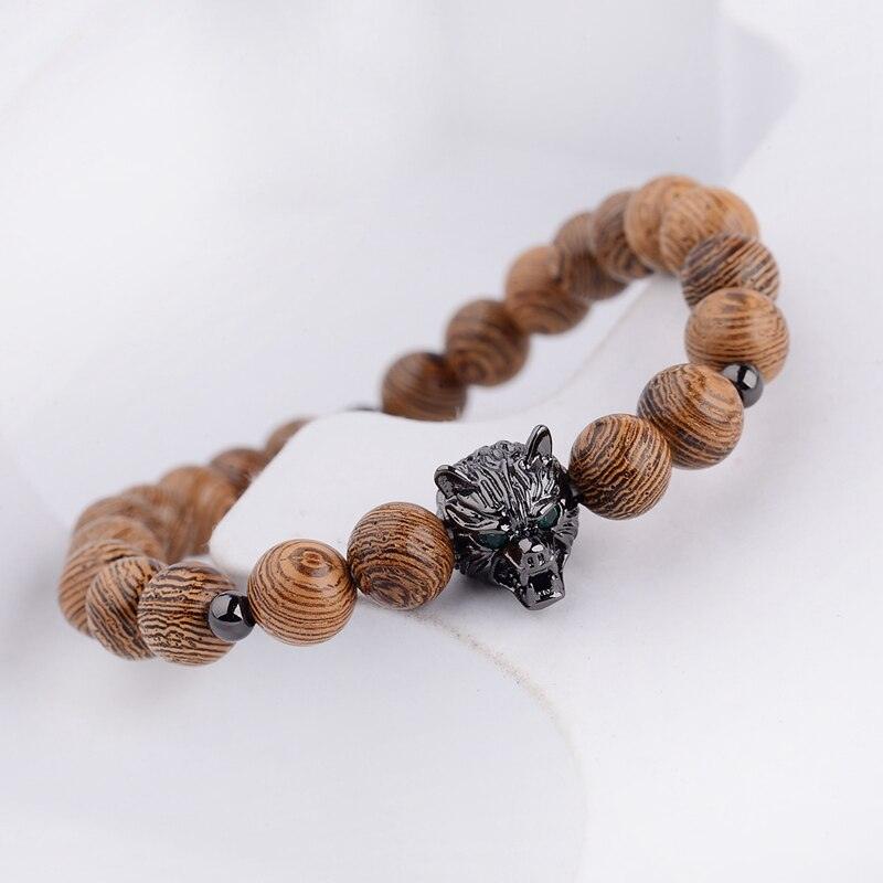 ABJ016-3 puinen rannekoru suden pää lumowood aarni havu